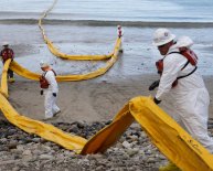 Who clean up oil spills?